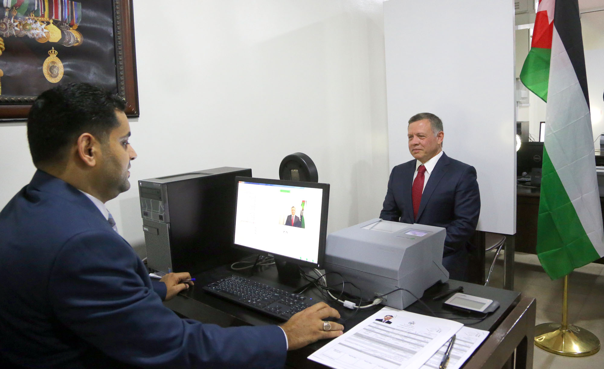King visits Civil Status and Passports Department, obtains smart ID card