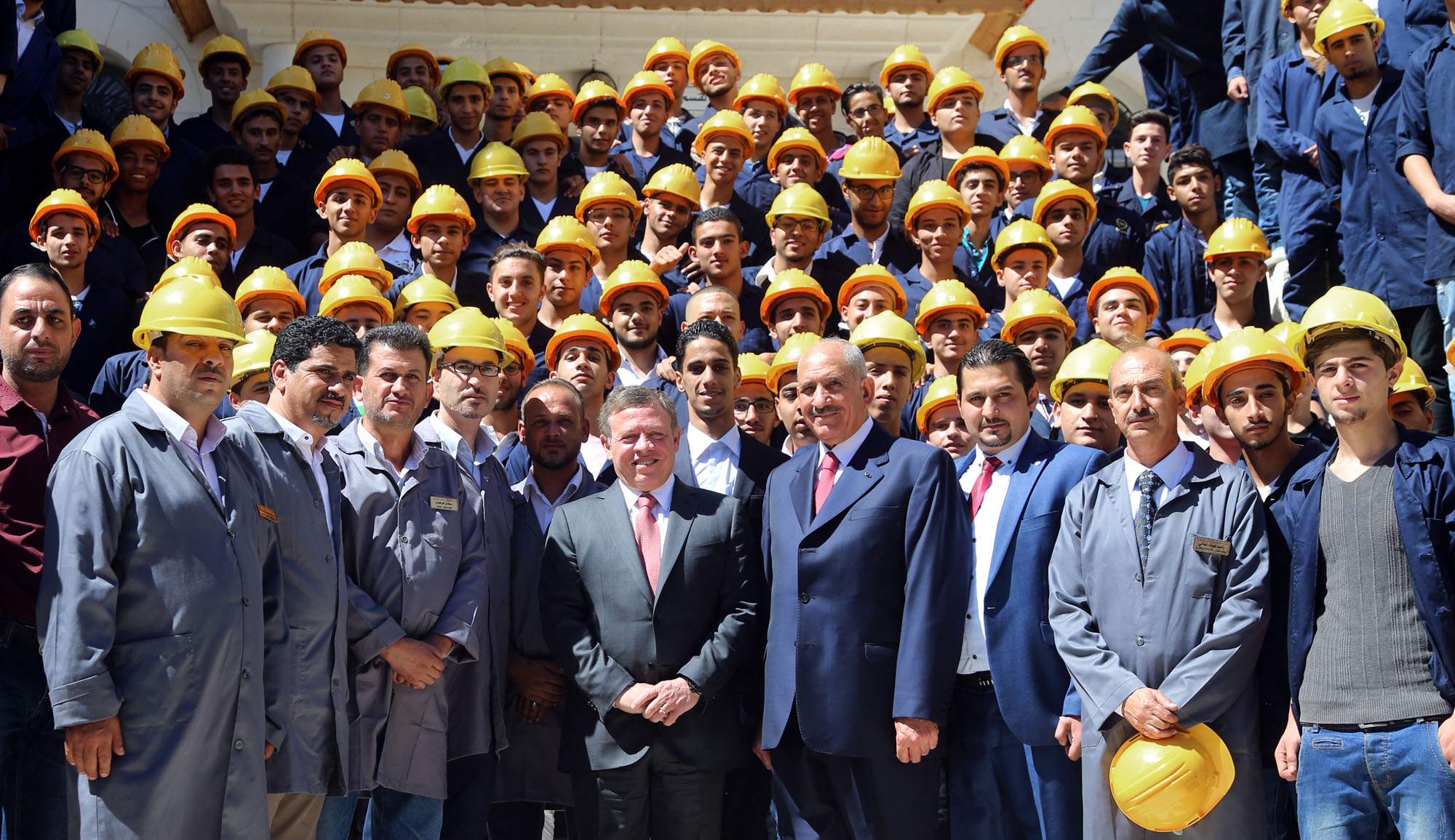 King checks on progress in vocational school