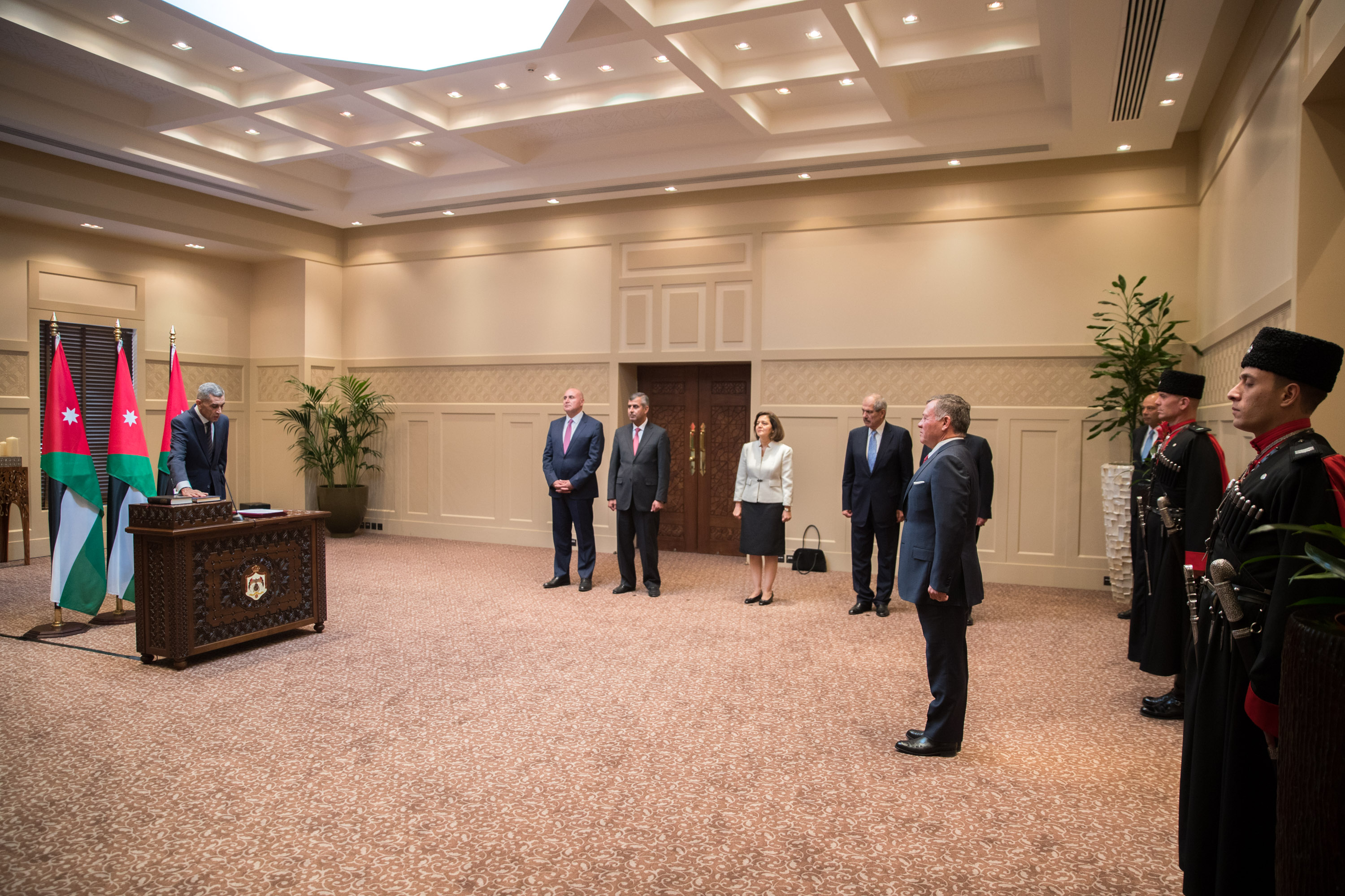 King swears in new ministers