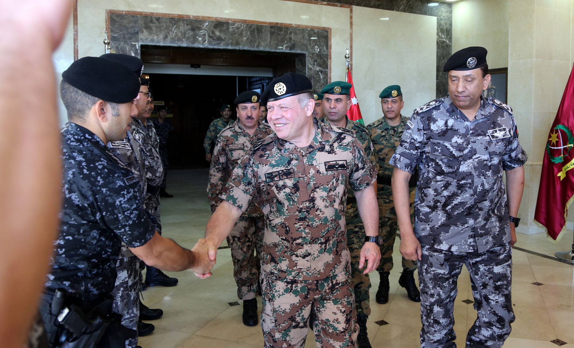 King visits gendarmerie headquarters