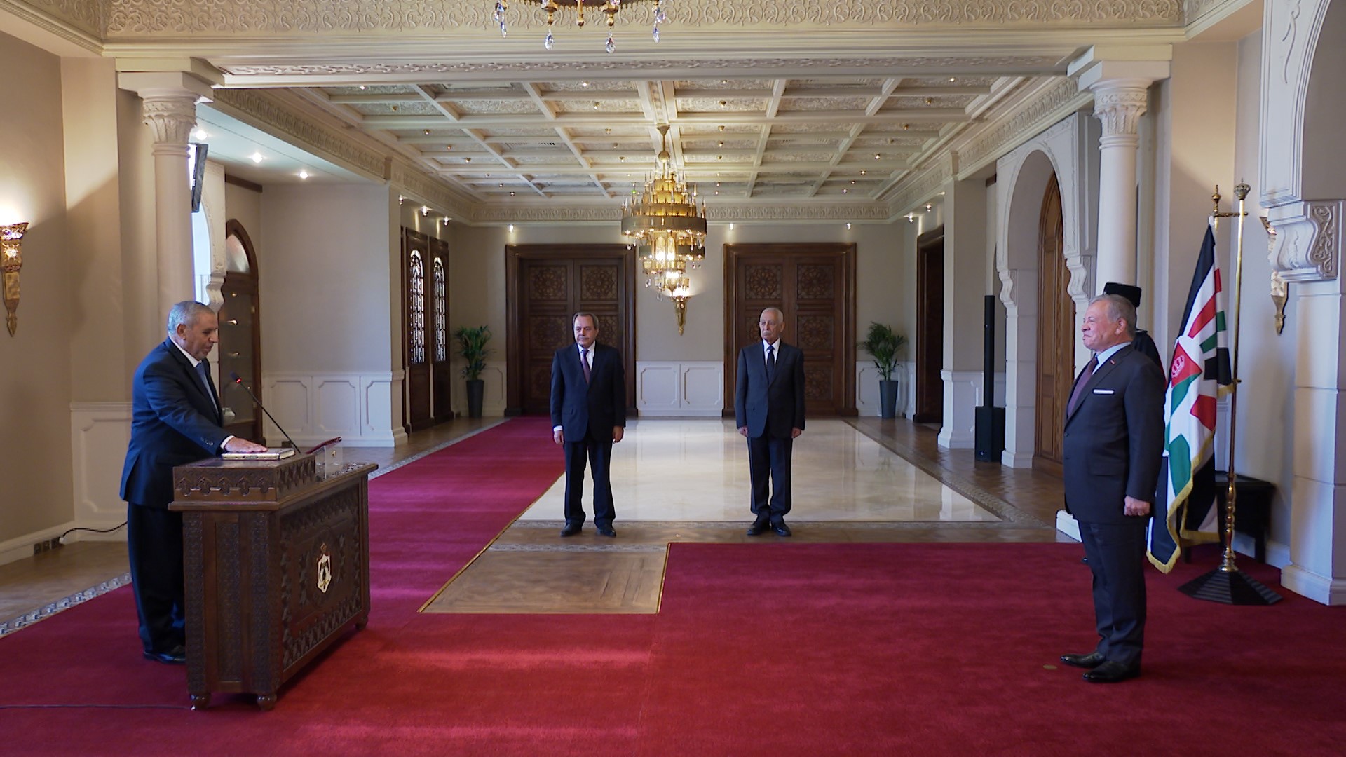 King swears in new president, member of Constitutional Court